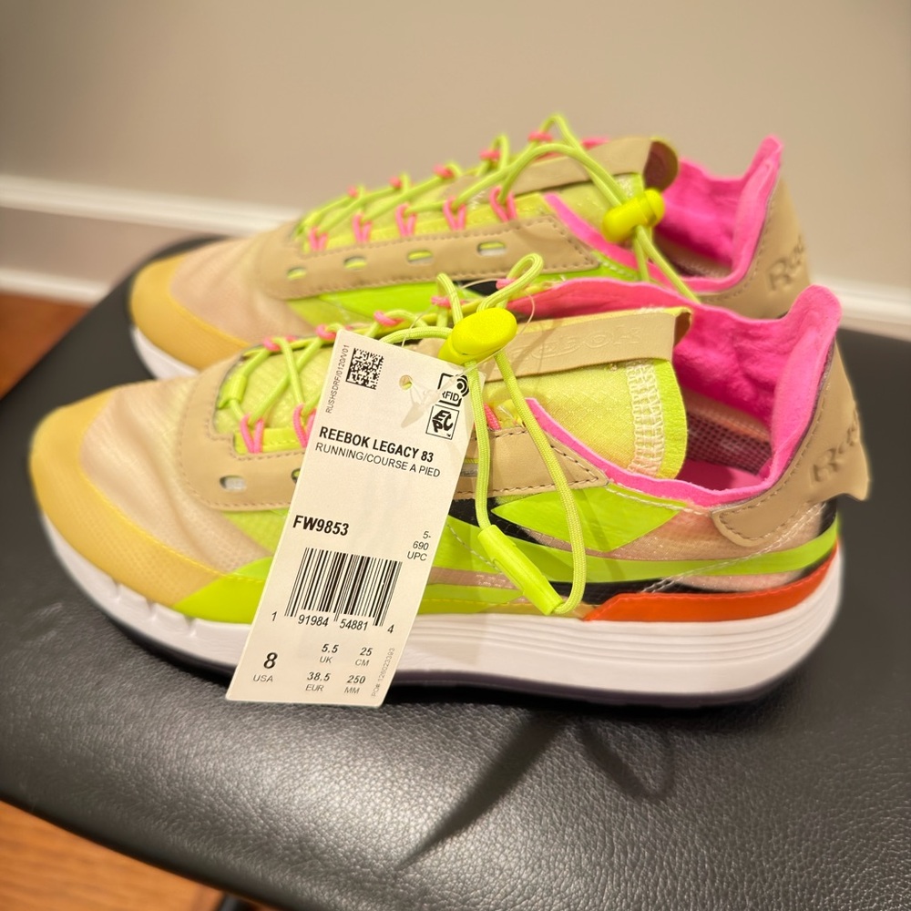 Reebok Women’s Legacy 83 sneakers in beige, neon yellow & hot pink